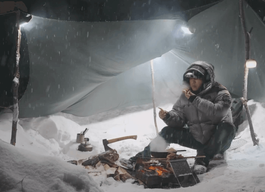 Solo snow camping ultralight shelter setup